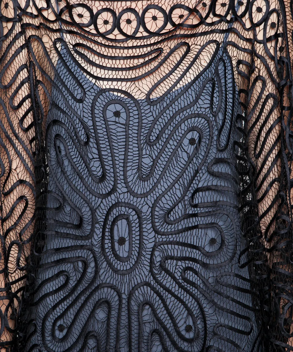 THE AMELIE OPENWORK PONCHO IN NOIR